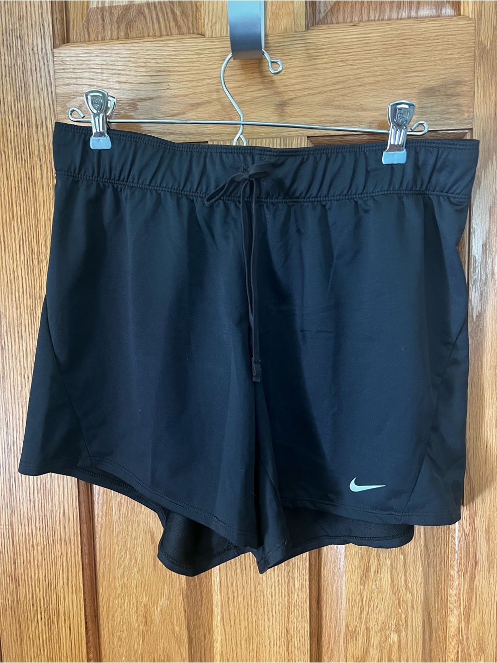 Nike Black Women's Athletic Shorts with Light Blue Swoosh